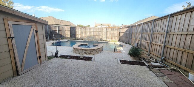 Building Photo - Spacious 4-Bedroom Home with Pool & Spa in...