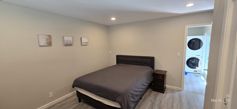Spacious bedroom with a comfortable queen-size bed. - 503 Yorkshire Dr