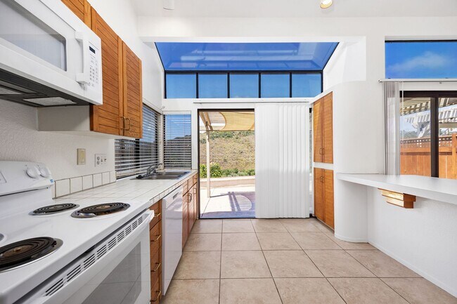 Building Photo - Private Back Yard with Expansive View of Tecolote Canyon!