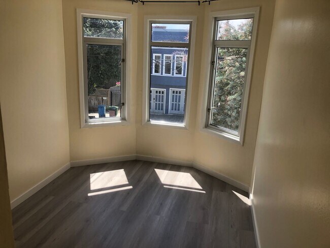 Building Photo - Remodeled top floor rent controlled apartm...