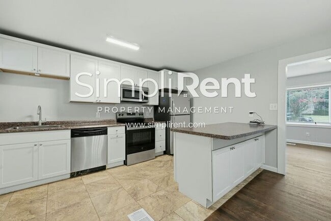 Building Photo - *First Month's Rent Free w/ a 13 month Lease*
