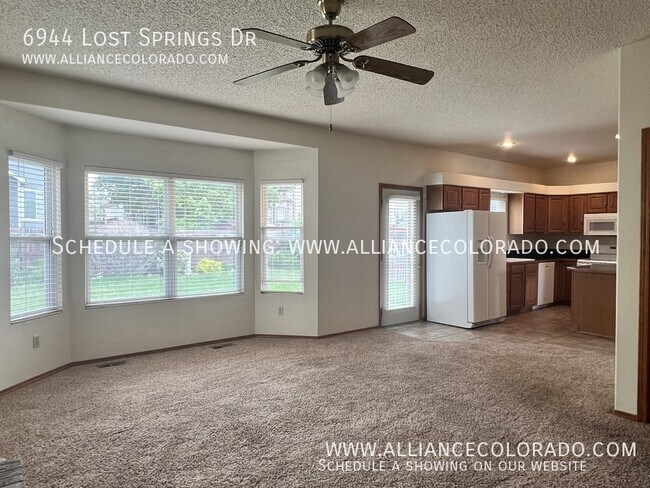Building Photo - 6944 Lost Springs Dr