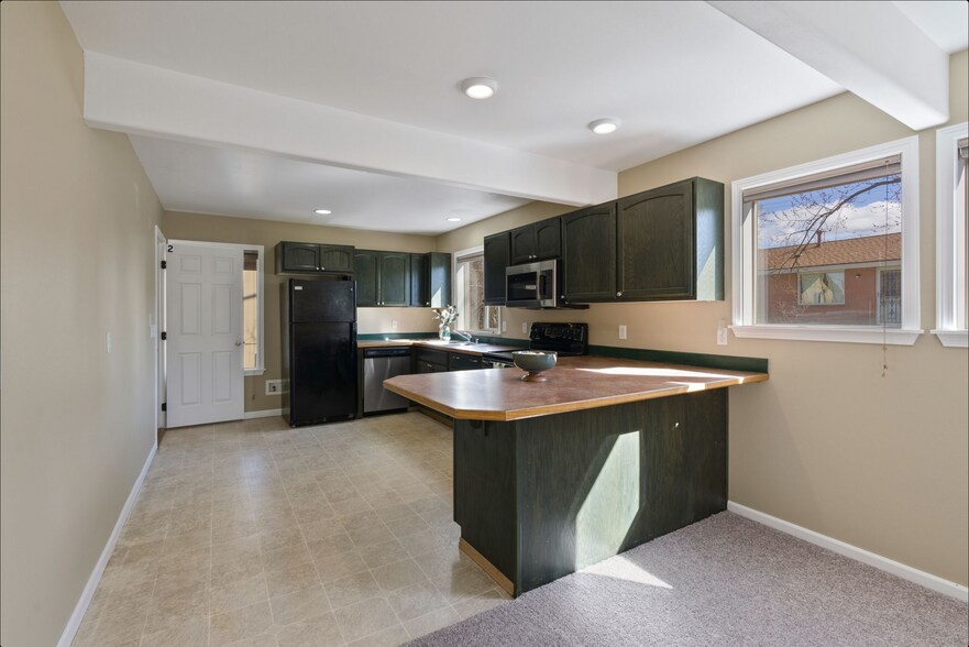 Main floor kitchen - 3519 E 25th Ave