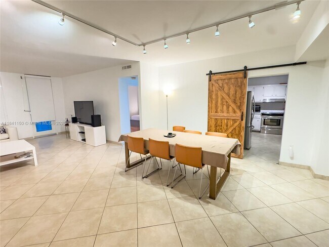 Building Photo - 10185 Collins Ave