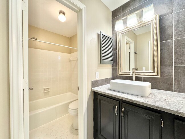 Building Photo - Well Maintained 3 Bedroom with Large Back Deck & Detached Garage!