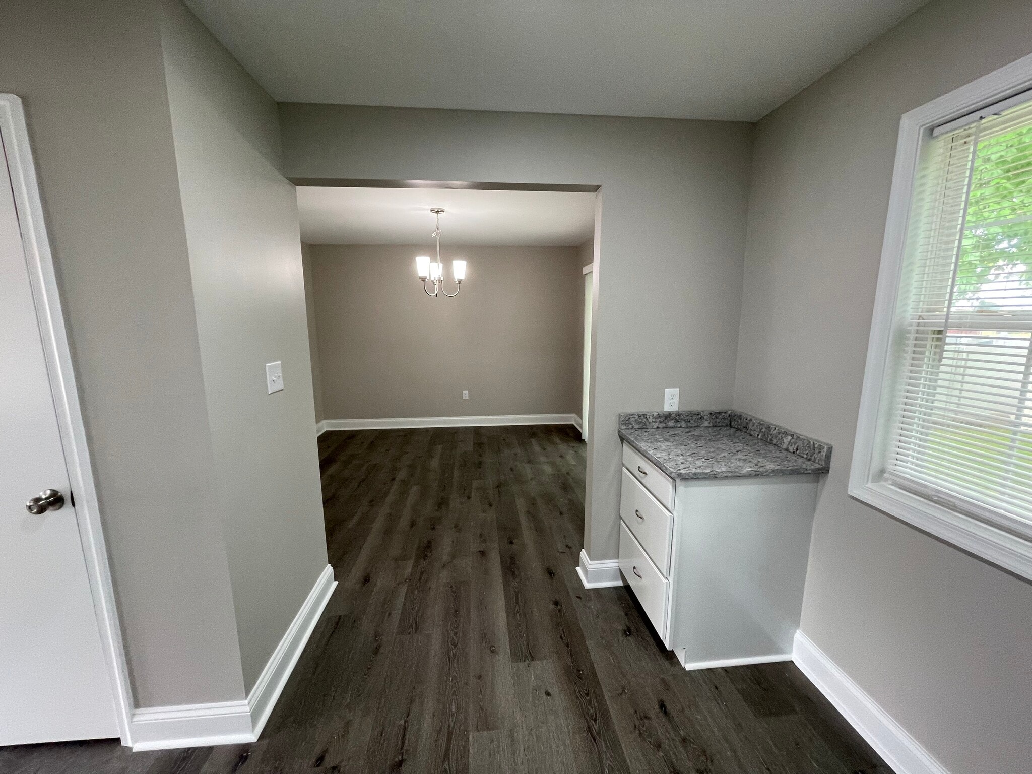 View from Kitchen to Dining Room - 903 Queens Ct