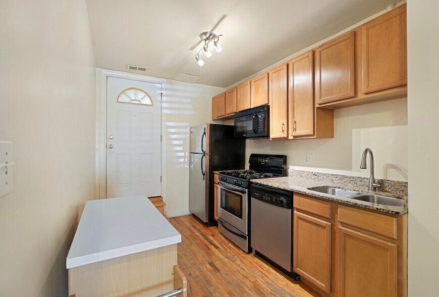 Kitchen view into the back door - 2554 W Rosemont Ave
