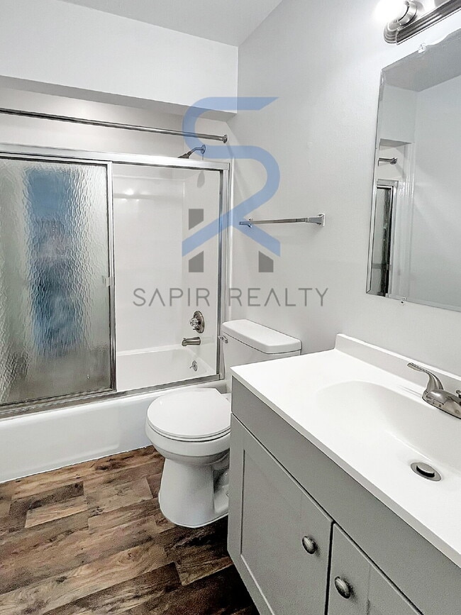 Building Photo - Move in before December 15th and choose your reward: a $250 Amazon Gift Card or a 55" Smart TV!