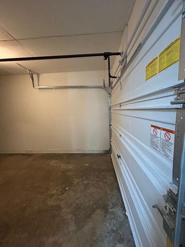 Building Photo - Beautifully Redone 3-Bedroom, 1.5-Bathroom Condo with Attached Garage – $1,725/Month (Lawn Care &...