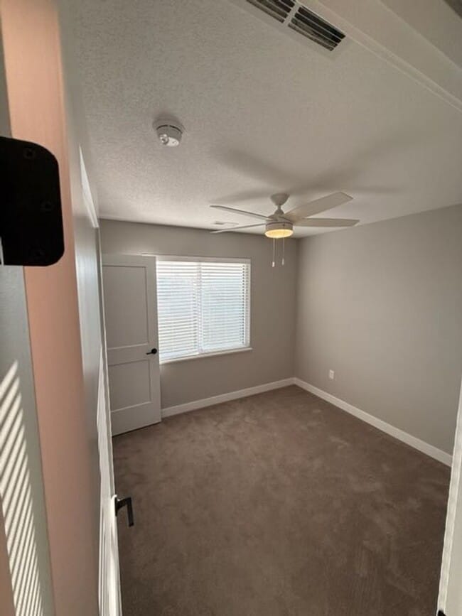 Building Photo - Spacious 4-Bedroom Home with 2-Car Garage & Yard