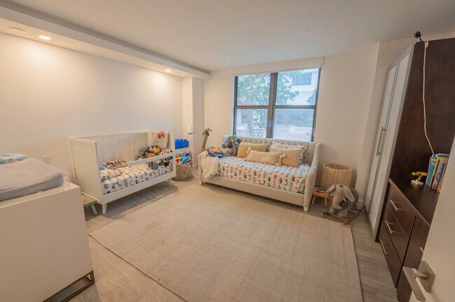 Building Photo - 9801 Collins Ave