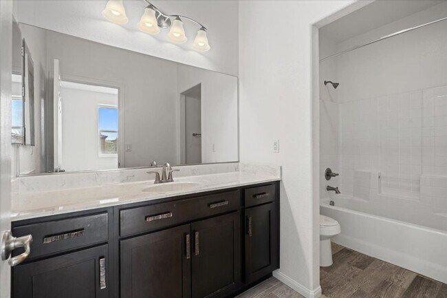 Building Photo - Sophisticated 3 Bedroom Retreat with Designer Finishes & Entertainer’s Backyard