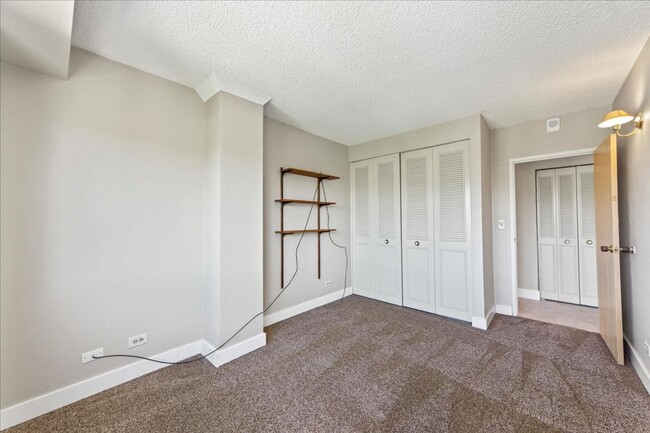 Building Photo - Stylish Imperial Plaza Condo in Prime Downtown Location