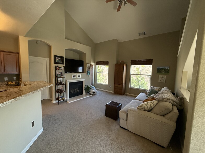 Living room with gas fireplace - 9050 Double R Blvd