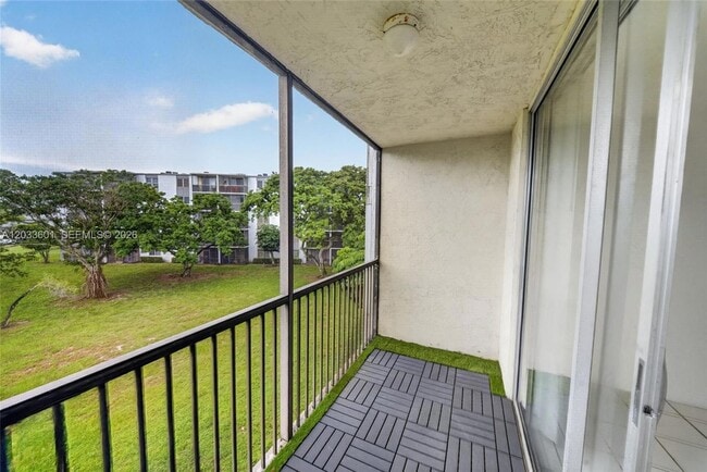 Building Photo - 8750 N Sherman Cir