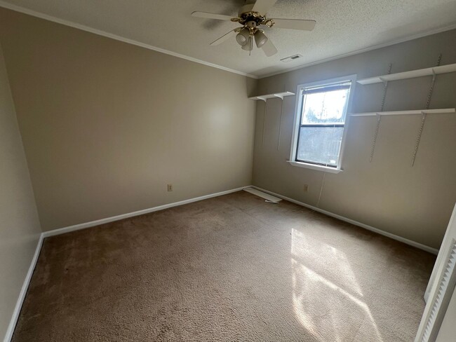 Building Photo - Delightful three bedroom two bath home in a serene country setting in Hubert. Just a short drive ...