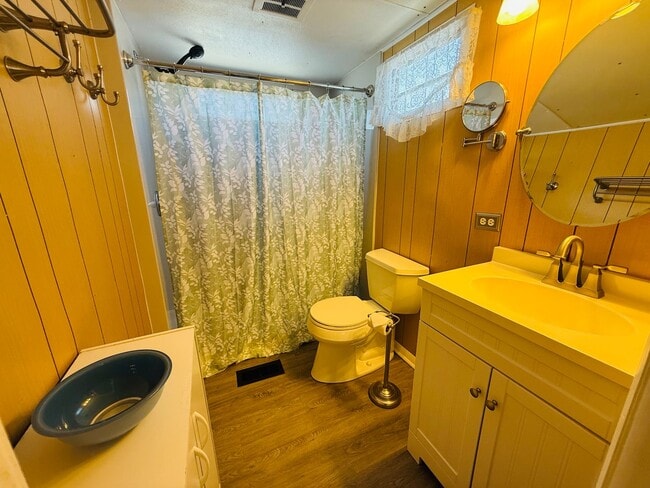 Building Photo - Beautiful fully furnished one bedroom, one bath manufactured home in a 55+ deed restricted gated ...