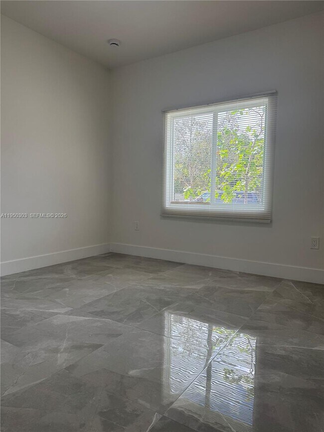 Building Photo - 4493 NW 15th Ave