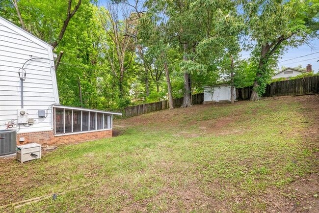 Building Photo - Large Home in Four Seasons Area, Hardwoods, Dining Room, Screed Porch, Fenced!