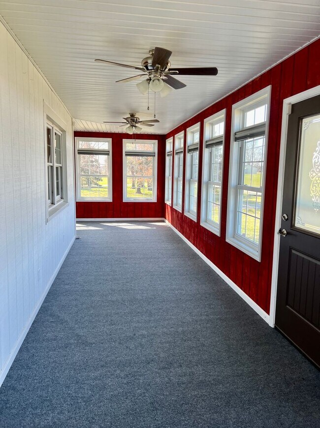 Building Photo - Country living! 1st floor laundry 3+ car garage with work shop