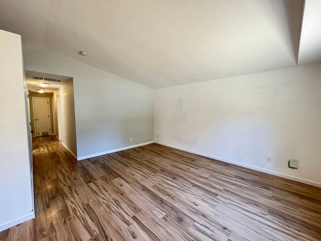 Building Photo - This Adorable 3 Bed / 2.5 Bath Ranch Style Homes Offers A Large Backyard and Beautiful Natural Li...