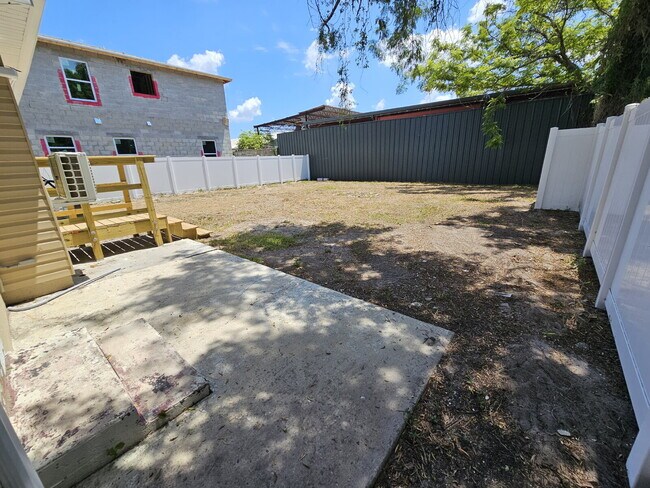 Building Photo - fully renovated 2-bedroom, 1-bathroom home with bonus guest room or office and oversized fenced yard