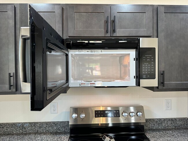 Building Photo - NEW 5 Bed 3 Bath w/ Walk Out Basement Waynesville School District