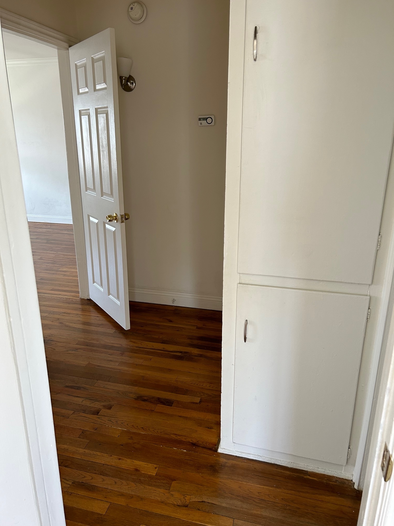 Hallway with storage cabinets - 5555 Costello Ave