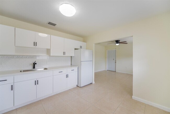 Building Photo - 6320 NW 1st Pl