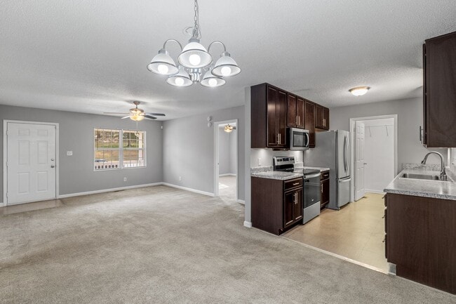 Building Photo - SW - Like New Home! Newer SS Appliances & Cabinets, Ceiling Fans, Blinds, Front Porch and Deck. M...