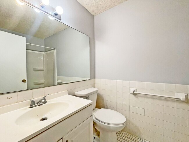 Building Photo - Spacious End-Unit Townhome with Fireplace, Family Room, 2-car Garage, Community Pool & Playground...