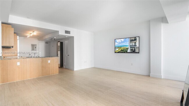Building Photo - 10275 Collins Ave