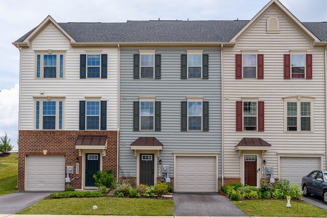 Primary Photo - Townhouse with 1-Car Garage, Rooftop Deck ...