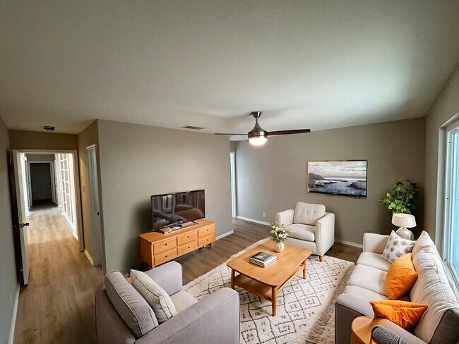 Building Photo - NEW PAINT, FLOORING, APPLIANCES & ROOF  | ...