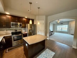 Building Photo - This townhome-style condo truly has it all!