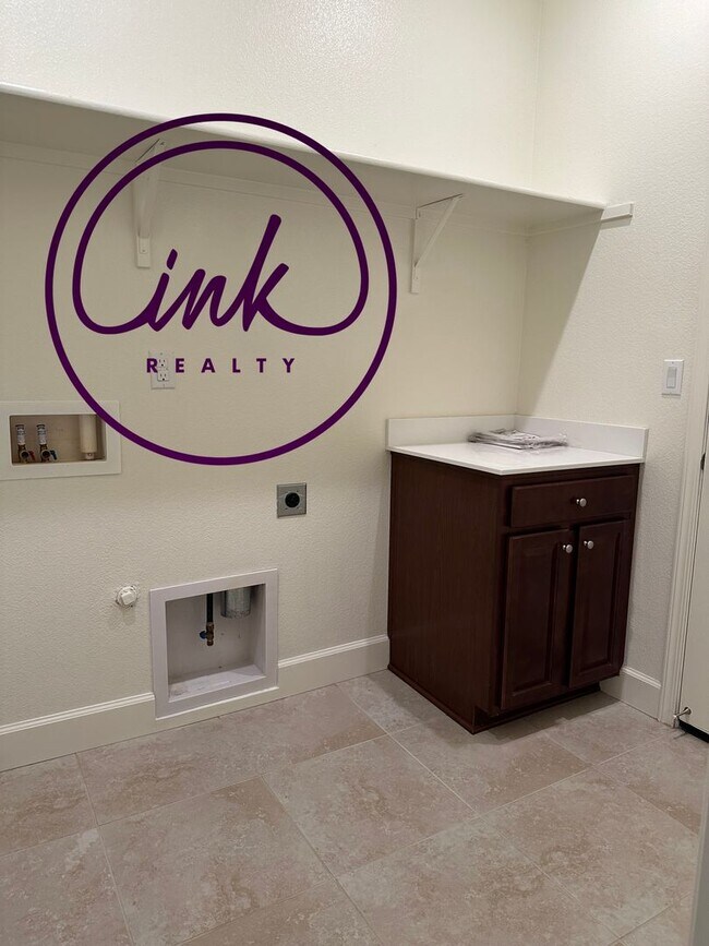 Building Photo - Four Bedroom Single-Family Home