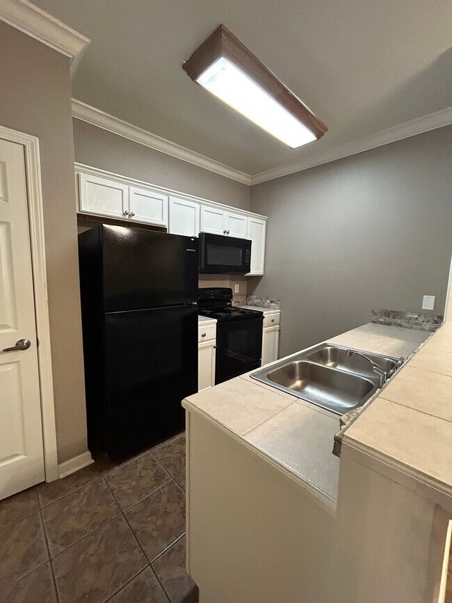 Building Photo - CONDO UNIT IN DENHAM SPRINGS