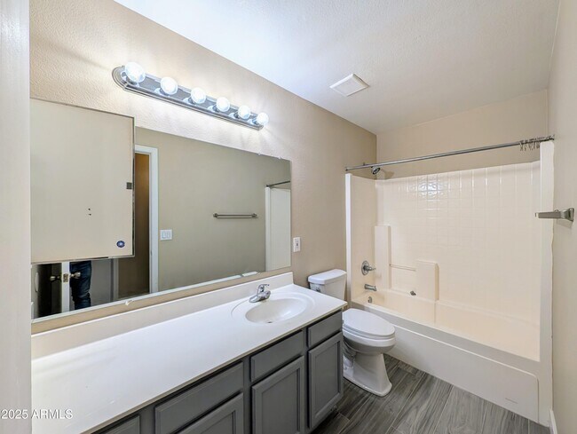 Building Photo - 7059 W Gardenia Ave