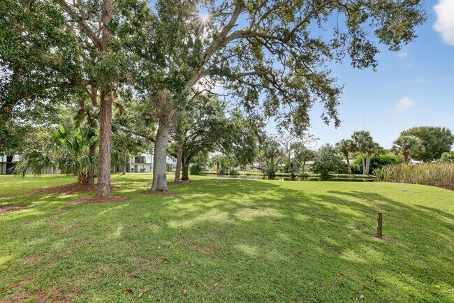 Building Photo - Outstanding one-bedroom, one-bath property with water views and upgrades.