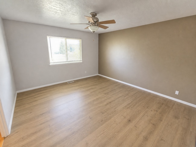 Building Photo - Spacious Home with 3-Car Garage, Two Living Areas & Covered Patio