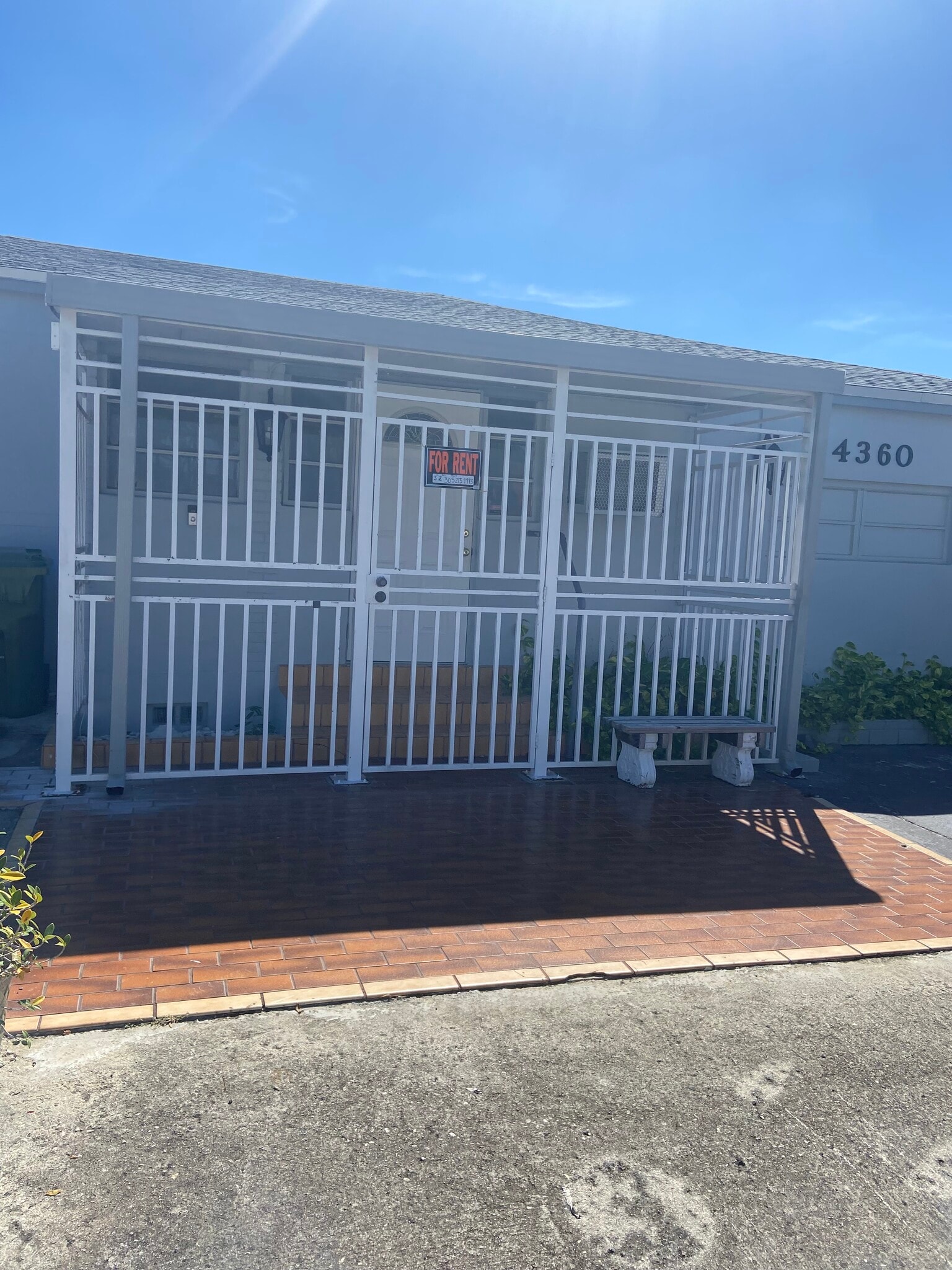 Front of home efficiency private entry right side with ring - 4360 SW 2nd Ter