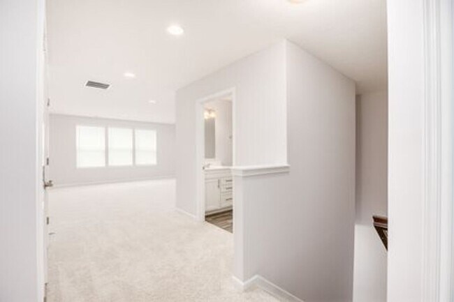 Building Photo - Updated 3-Bedroom Home with 3 Baths, Open-Concept Layout, Luxury Flooring & Bright Modern Kitchen