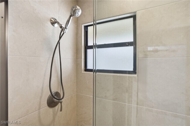 Building Photo - 7048 Pelican Bay Blvd