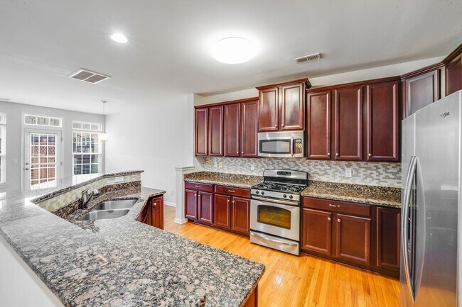 Building Photo - Townhomes at Ayrsley: Stunning 3-Bedroom Home with Modern Flair!