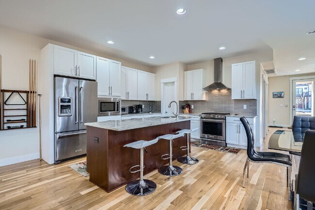 Building Photo - Available NOW! SIX MONTH LEASE - Spacious 3-Bedroom Townhouse with 3.5 Baths in Vibrant Sloans Lake!