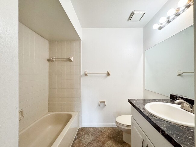 Building Photo - Tamarind - Renovated 2 Bedroom 2 Bath Condominium