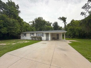 Building Photo - "Charming 3-Bedroom Gem in Land O' Lakes – Your Cozy Retreat Awaits!"