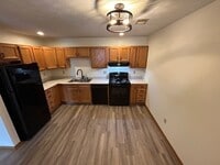 Building Photo - 2-Bedroom Ranch in Peaceful Piqua Neighbor...