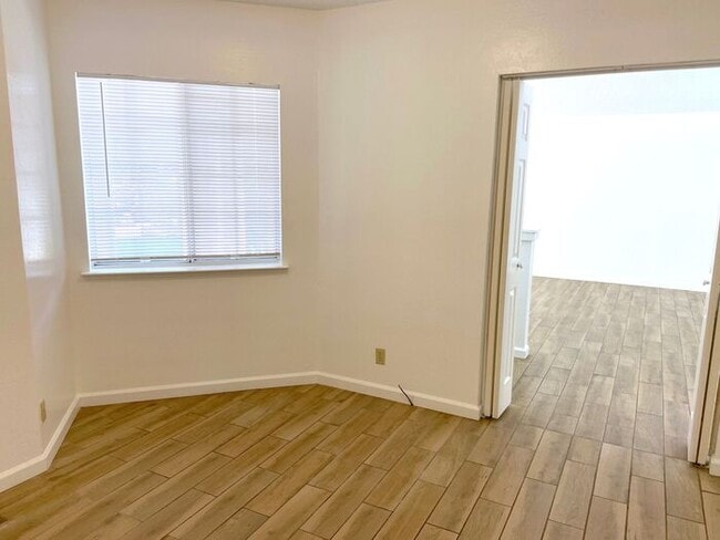 Building Photo - Coming Up Roses - NW Reno 4 Bedroom/3 Car Garage Single Story House