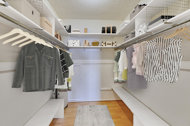 walk-in closet, one of two - 1800 Old Meadow Rd